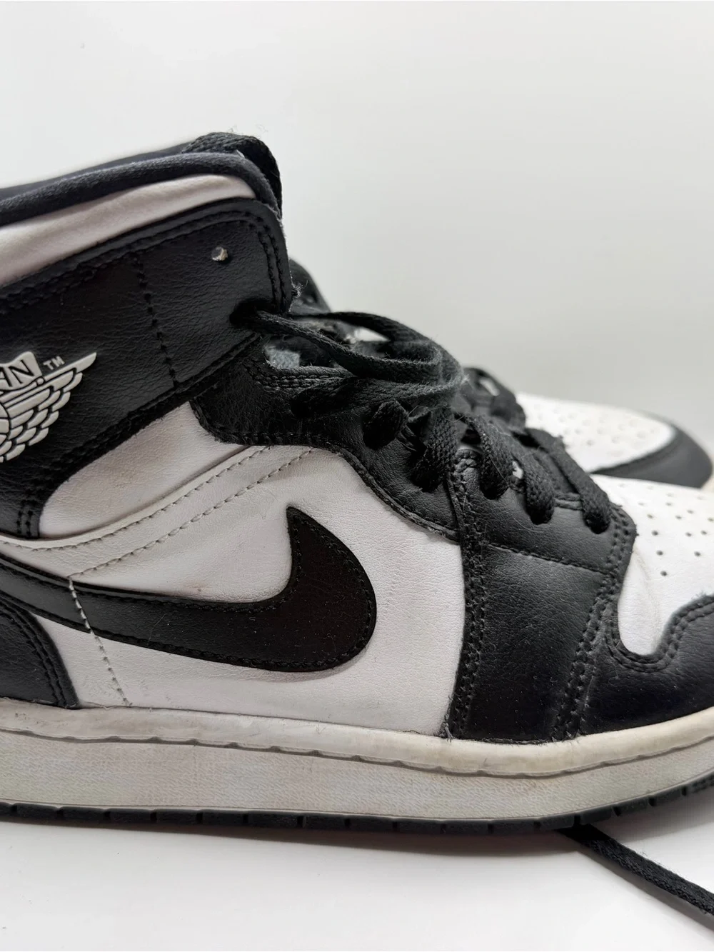 Jordan Black/White High Top Sneakers